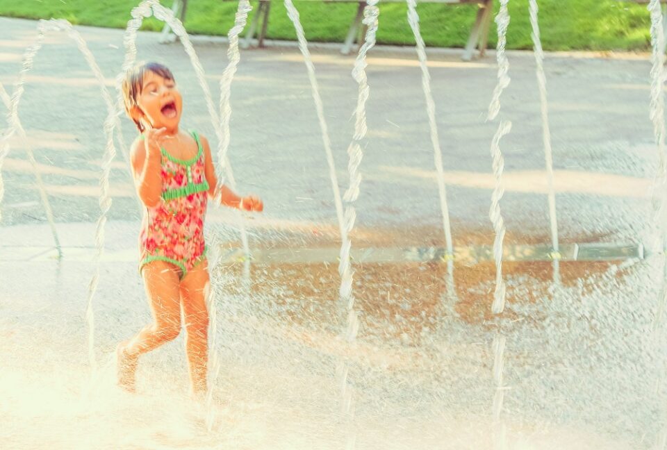 Girl playing in splash pad